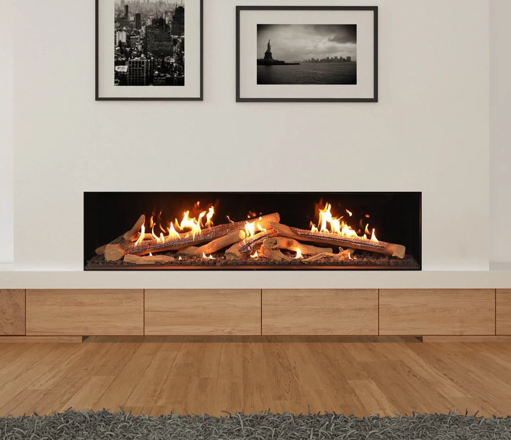 Wide inset fireplace above oak cabinetry